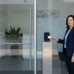 Employee using a commercial access control card reader